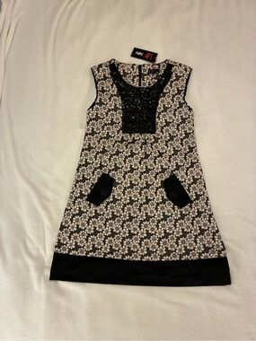 Yumi Black and White Floral Shift Dress with Embellished Bib
